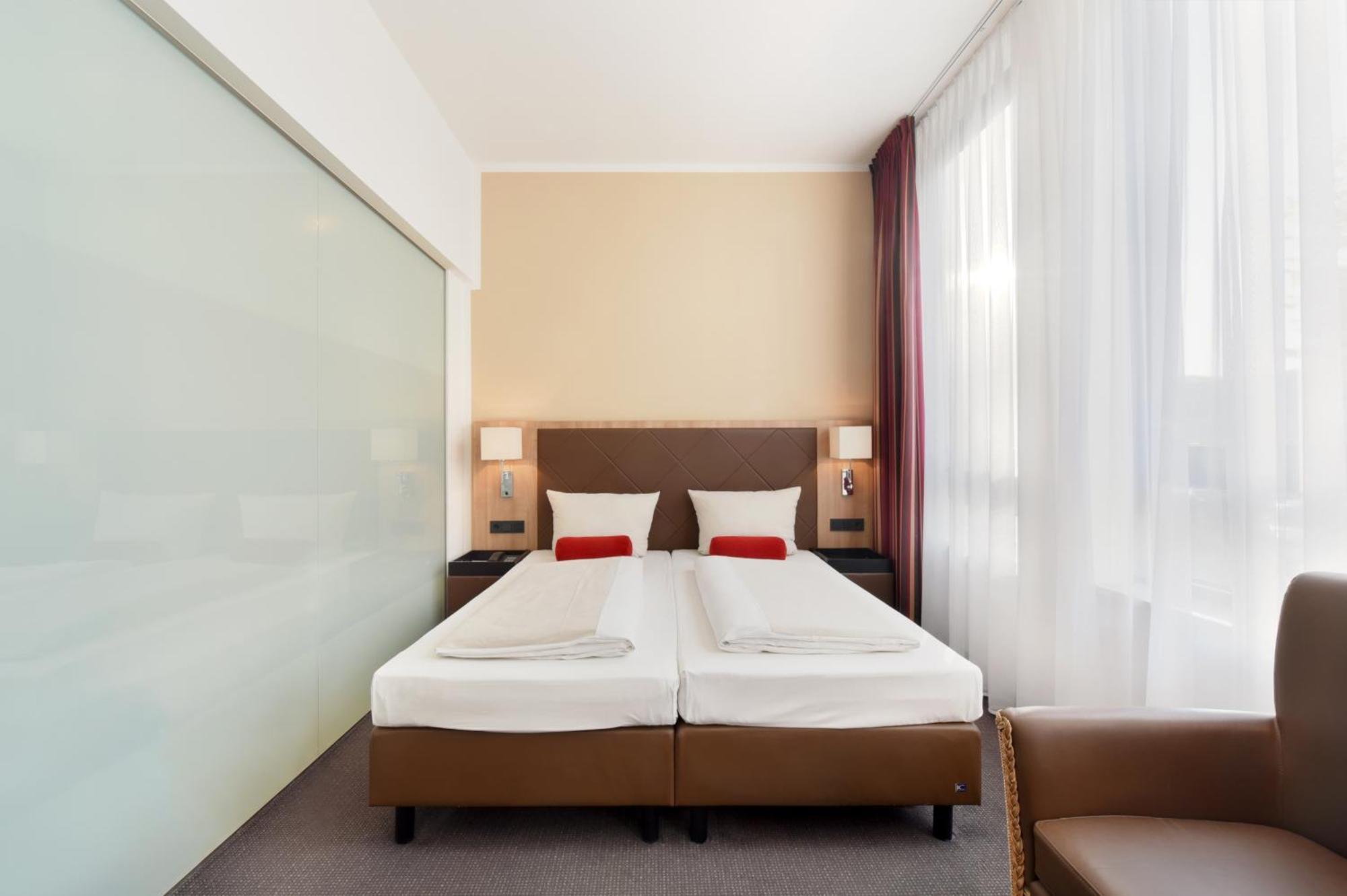Achat Hotel Muenchen Sued Munique Quarto foto